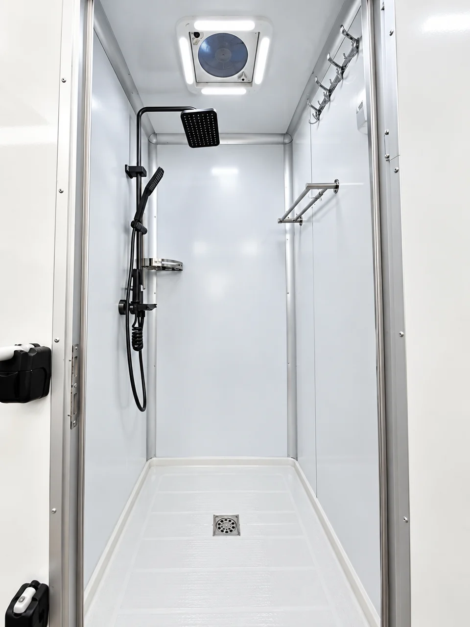 Private shower-only stall with overhead shower and hand shower