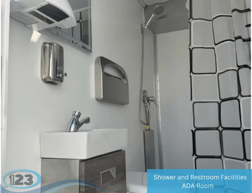 A bathroom featuring a shower and a toilet, with tiled walls and a clean, organized layout.